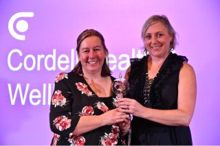 Dr. Nikki Cordell presenting an award at the Sirona Health Awards 2018