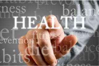 Finger pointing to words on a screen depicting healthy choices